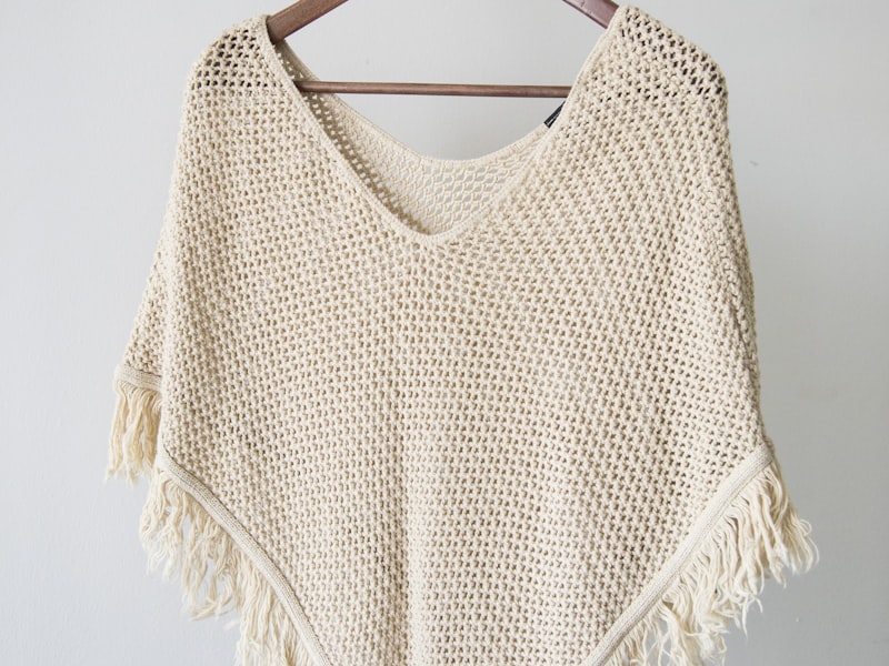 Cream knit poncho top